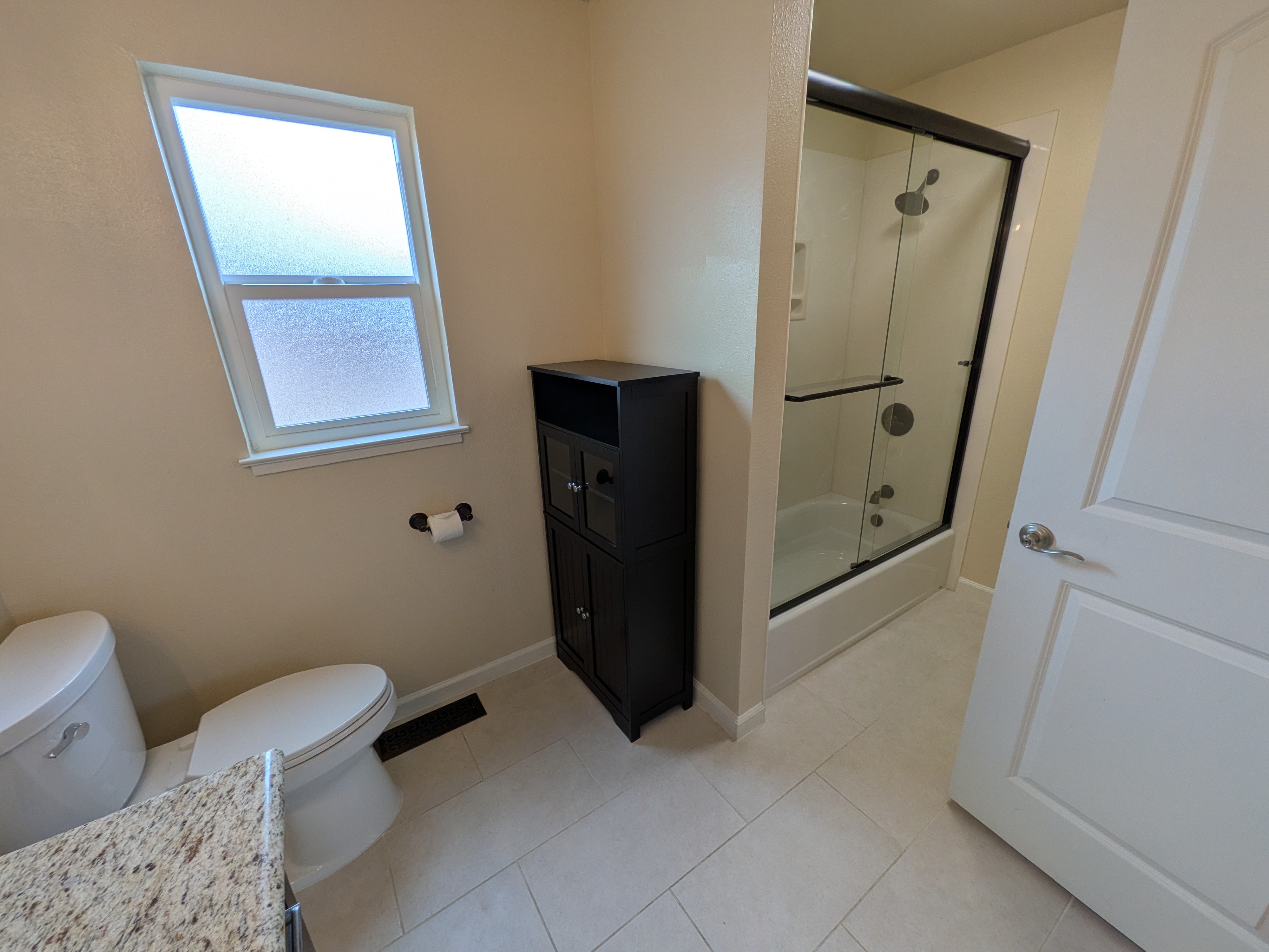 Glass-enclosed shower