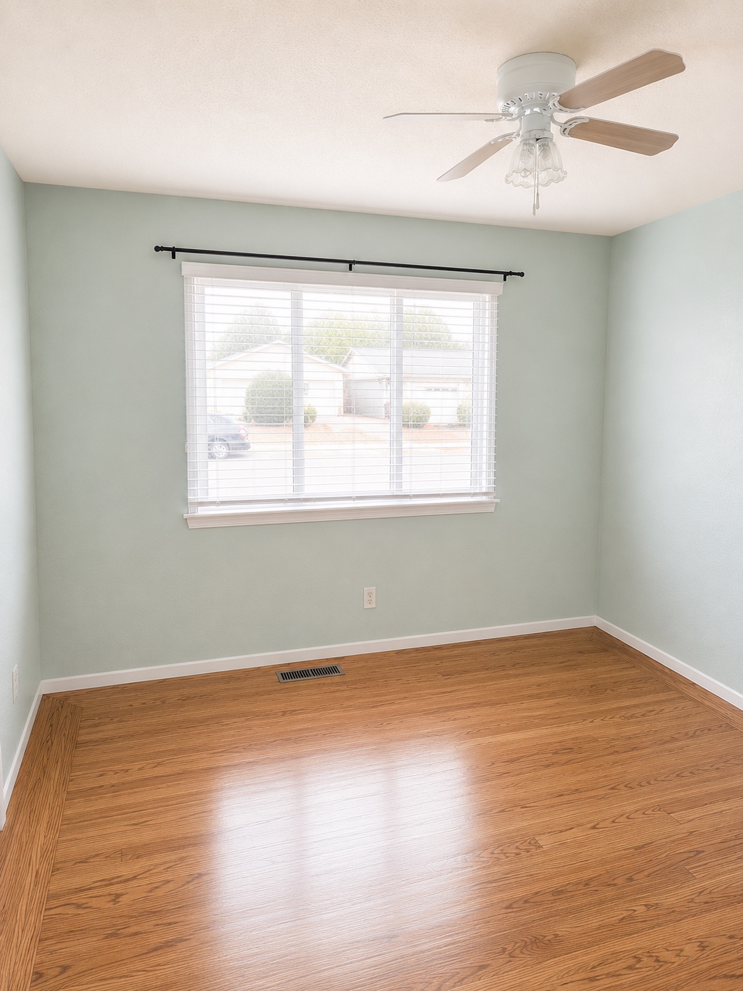 Sage bedroom with garden views